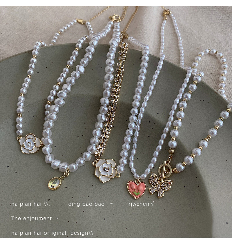 Retro Heart Shape Bow Knot Alloy Inlay Artificial Pearls Womenu0027S Pendant Necklace Necklace 1 Pie