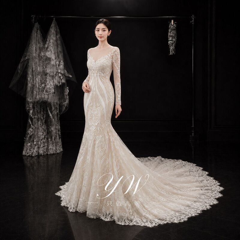 Long-sleeved sheer round-neck champagne-colored mermaid wedding dress with heavy vintage lace and a train, bridal gown factory OEM/ODM Long-sleeved sheer round-neck champagne-colored mermaid wedding dress with heavy vintage lace and a train, bridal gown factory OEM/ODM