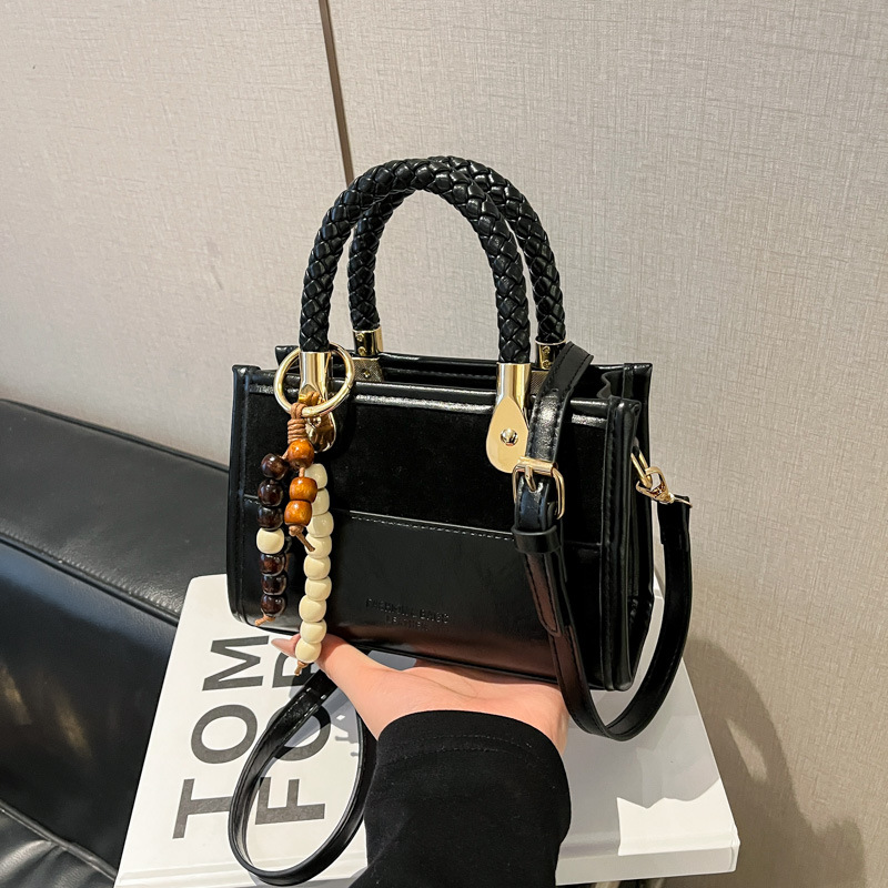 Niche Zhong Leopard Pattern retro bolso de mano mujer otoño / invierno 2025 nuevo estilo de alta calidad de viaje de hombro mochila