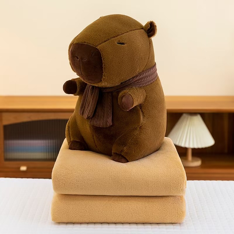 Caricatura capibara almohada manta dos en uno Carpibara cojín aire acondicionado es de doble uso niños siesta manta regalo