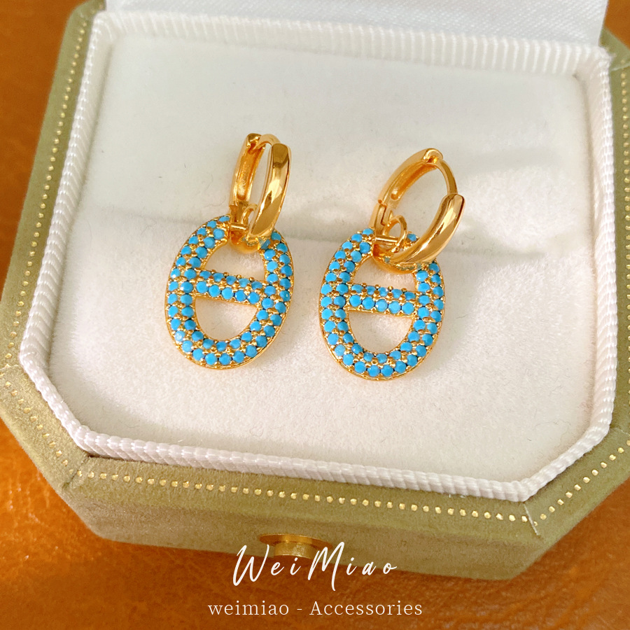 Zircon oval nariz de cerdo CD perfiles personales simples temperamento aretes ligeros lujosos alta sensación de auriculares al por mayor
