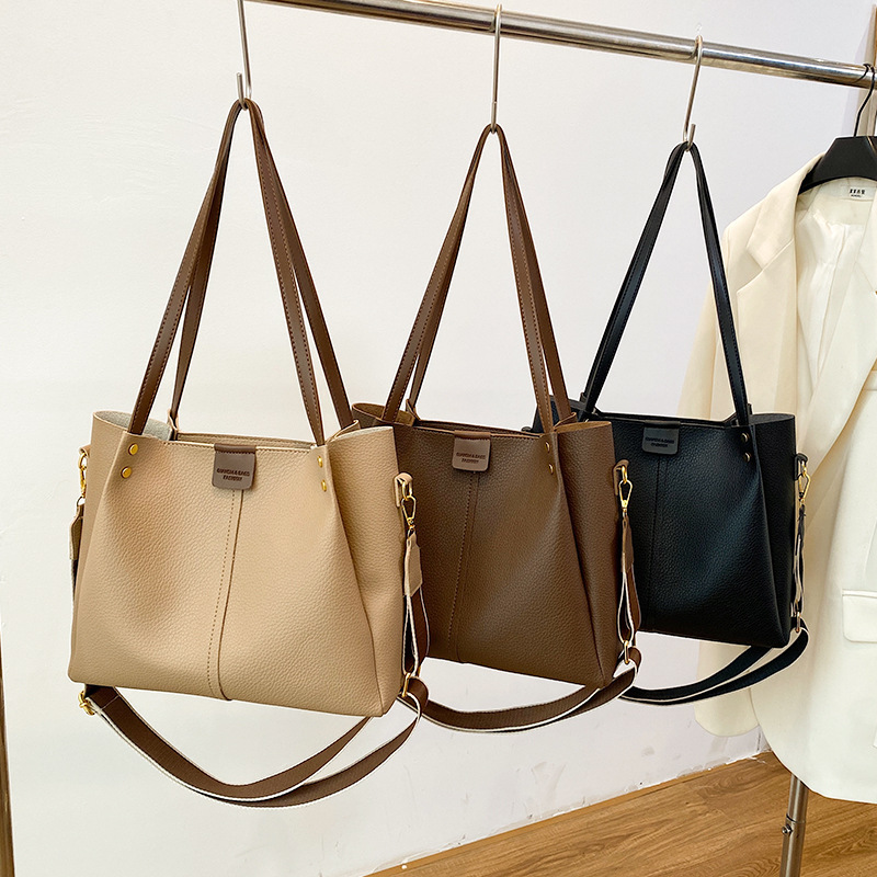 Bolsa de viaje de moda simple para mujeres 2024 nueva gran capacidad versátil bolso de hombro retro bolso de viaje