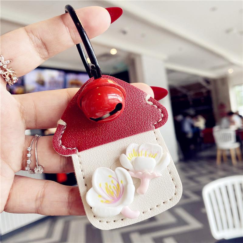 Cubierta de la llave nuevo corazón de niña explosiva Llavero Coche eléctrico PU Cubierta de la tarjeta de control de acceso para el hogar Sensor de gota de agua Amazon