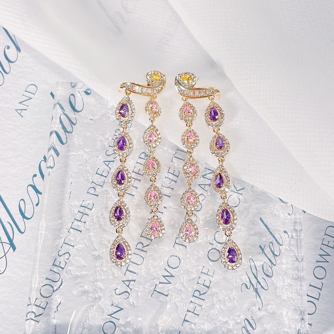 fashionable earrings drop-shaped with zircon