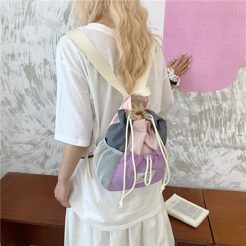 Mochila de moda coreana para mujeres de empalme de estilo extranjero, mochila de clase para estudiantes universitarios, mochila al aire libre