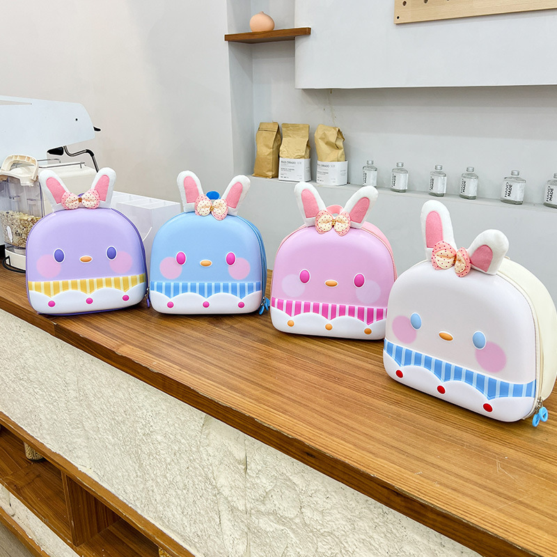 Nueva mochila para niños mochila para jardín de infantes pequeña banda caricatura lindo conejo para salir mochila de cáscara dura ligera