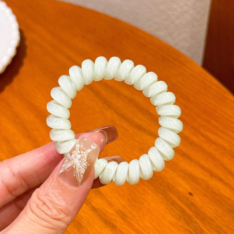キャンディー色の電話線の髪輪の女性は高弾力で長持ちします。|undefined
