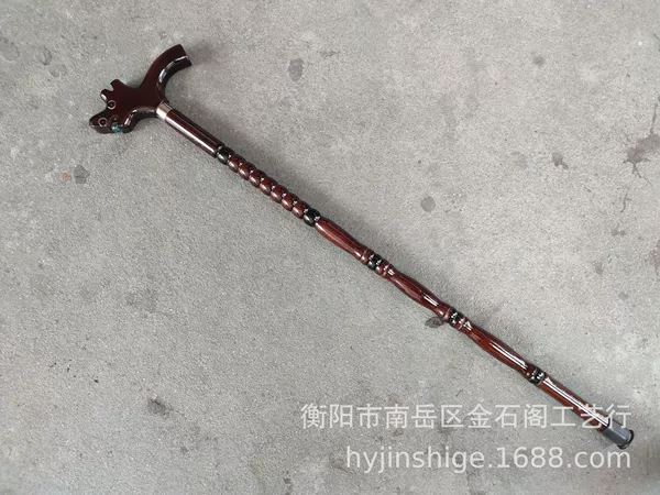 The brown gourd-shaped sandalwood crutch is about 94 cm long