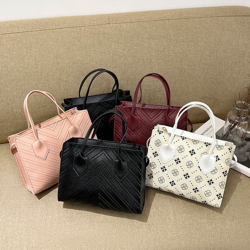 2023 nuevo estilo coreano de moda relieve V-patrón diamante bolso de hombro simple bolso de mano casual