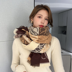 マフラーの女性は冬にシンプルで、韓国の両面の広いマントを飾っています。