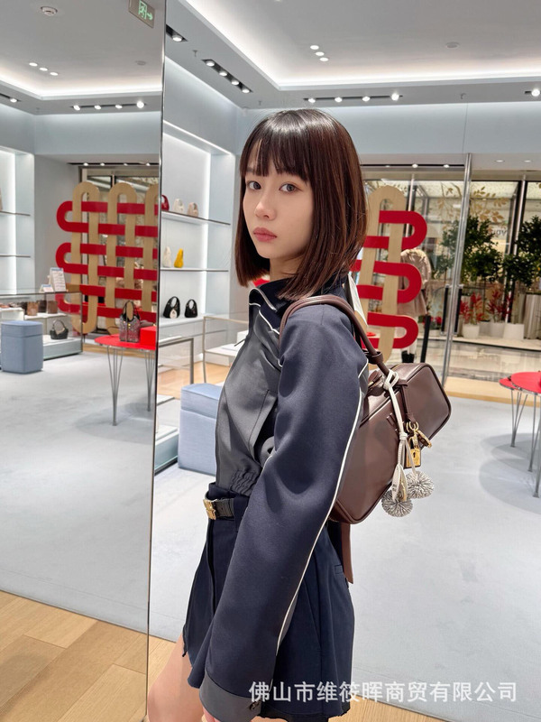 2025MIU 新しいロングハンドルボウリングバッグバゲットバッグソフトカーフスキン通勤多用途ショルダーハンドバッグ|undefined