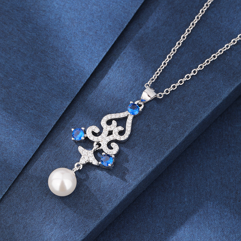 Collar de perlas de flor hueca de plata de ley 925 para mujer transfronteriza europea y americana elegante temperamento de moda con incrustaciones de cuentas de concha de circón