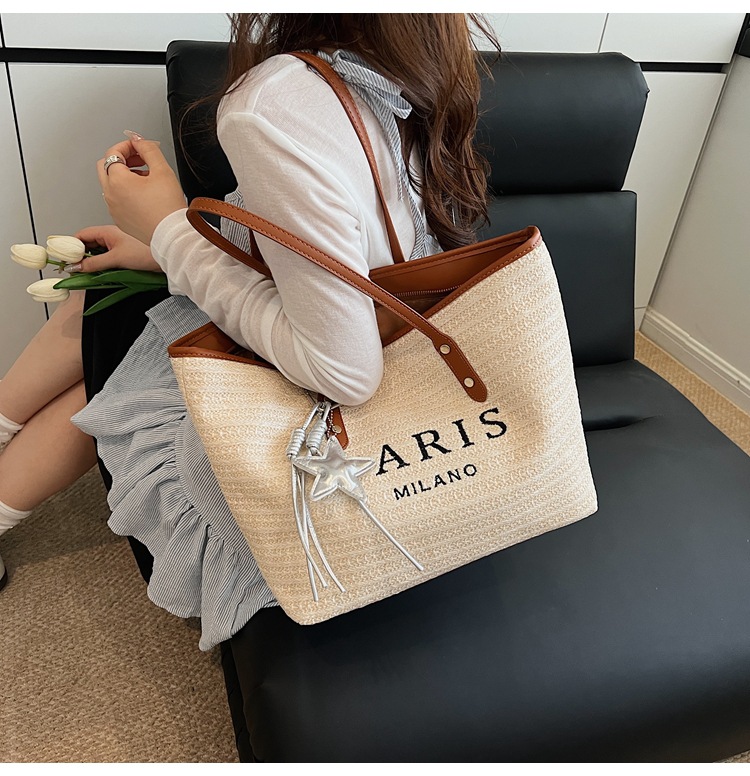 Summer striped woven large-capacity tote bag 2025 New style fashionable and trendy Korean style simple and elegant casual single-shoulder bag undefined