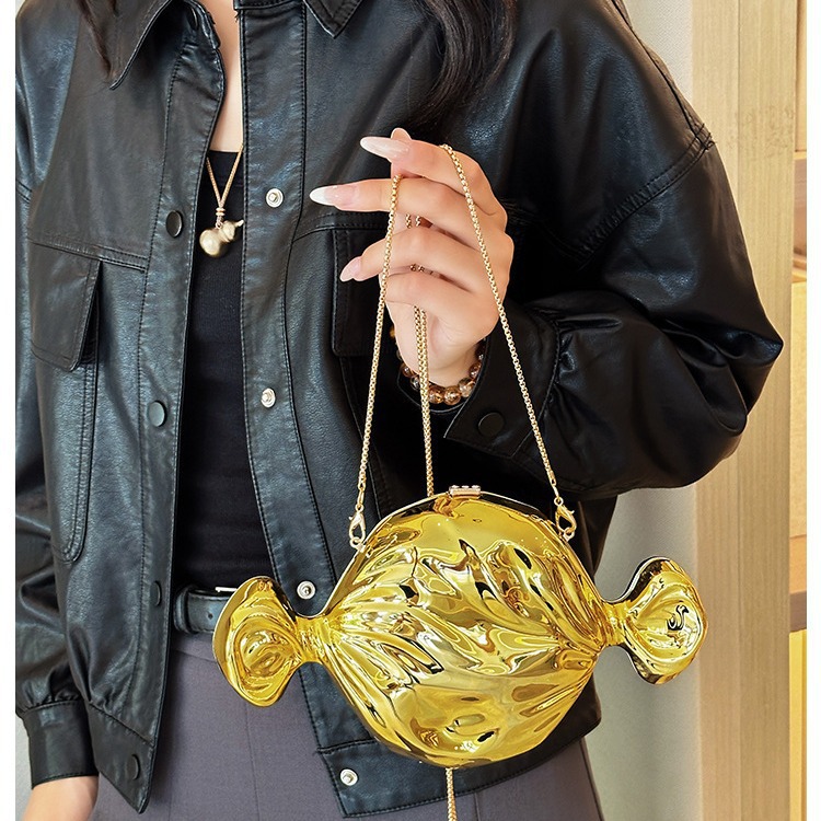 Bolsa de cena de lujo ligera transfronteriza cara brillante personalidad forma de caramelo bolso de mochila moda acrílico cadena bolso de noche mujer