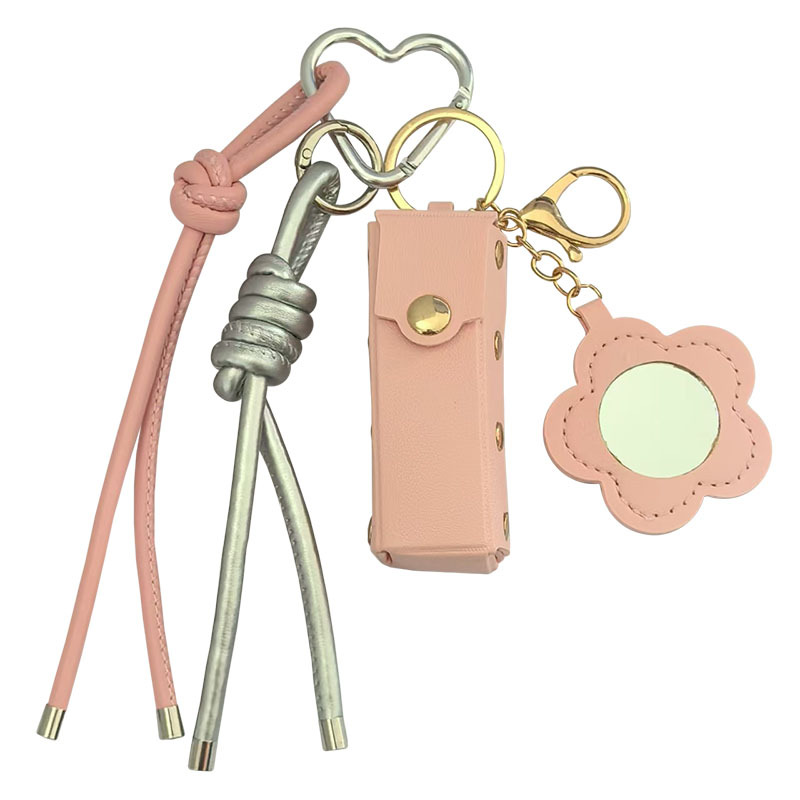 Espejo de cuero transfronterizo lápiz labial bolsas de llaves creativas flores portátiles maquillaje espejo bolsas colgantes accesorios de llaves PU
