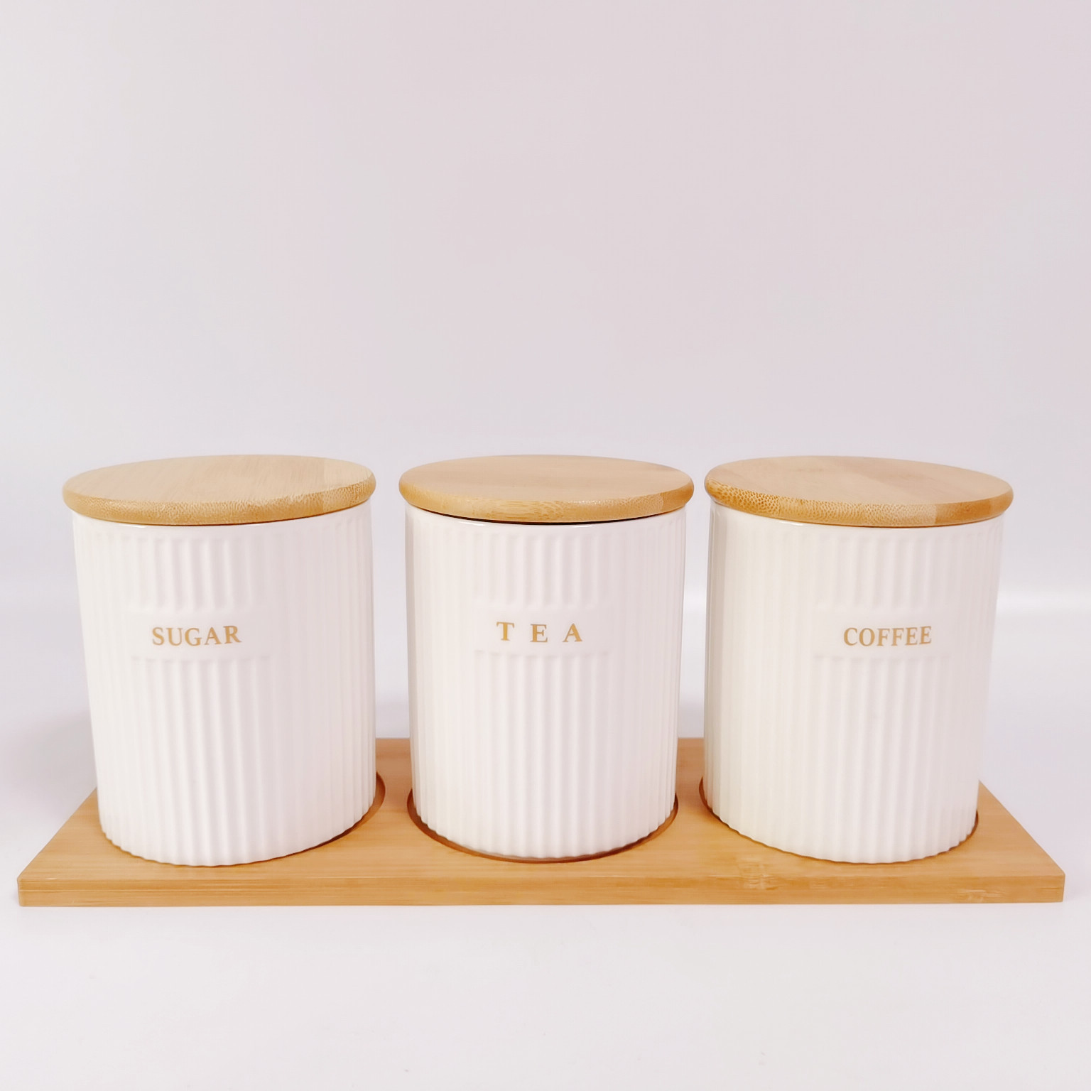 Fábrica directa de cerámica a rayas condimento tarro de almacenamiento tarro traje cocina almacenamiento tarro sal tarro hogar condimento tarro