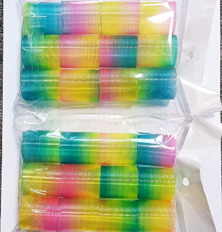 子供の魔力の虹の輪の表情の笑顔の虹のスプリングの輪の露店の弾力の積み重ねの輪の知育のノスタルジックなおもちゃ|undefined