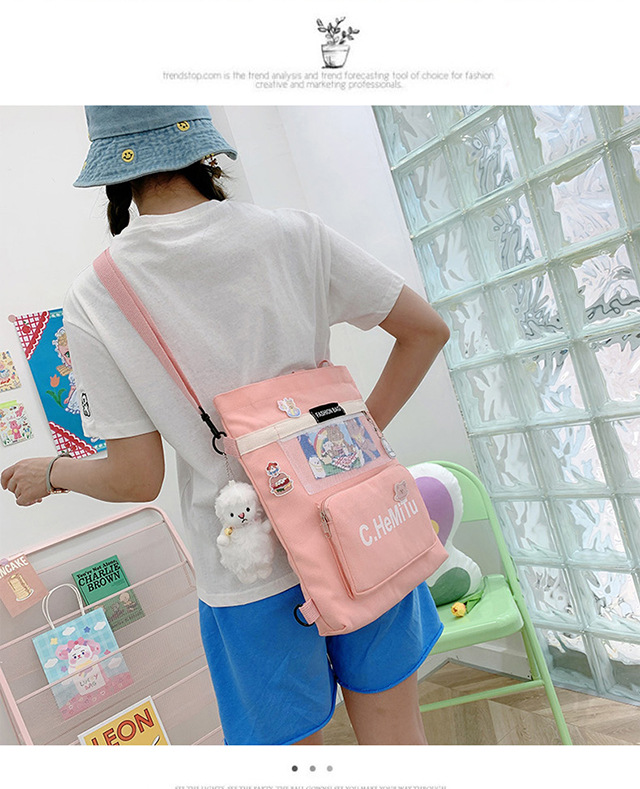 Korean-style canvas bag for girls with one shoulder, in the style of Harajuku, ulzzang, with a large capacity and contrasting colors, is a crossbody hand-held schoolbag for classes undefined