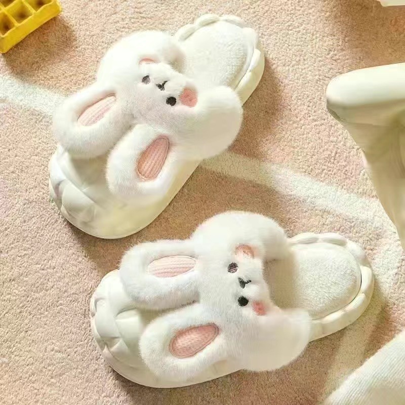 ウサギの新しい冬のinsスリッパは滑り止めで室内の家の防水を取り外して保温します。