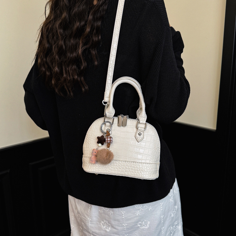 Verano estampado de piedra sensación diaria bolso de mano para mujeres 2026 nueva moda viaje bolsa de hombro bolsa de concha de tramo inclinado