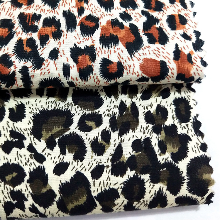 Inventario de alta calidad impresión de leopardo amarillo negro 100 algodón tela de ropa de seda