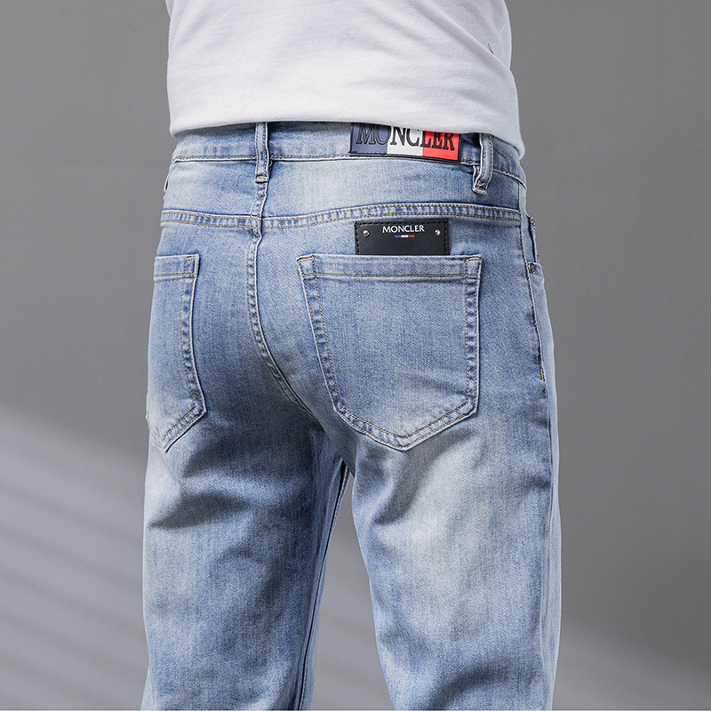 Primavera nuevos jeans para hombres coreanos delgados pies pequeños comercio exterior transfronterizo de alta calidad elástico Europa y los Estados Unidos 1: 1 pantalones al por mayor