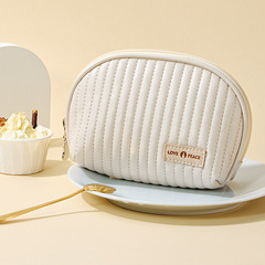 New cream cake cosmetic bag PU large capacity waterproof storage bag semi-circular portable cosmetics storage bag