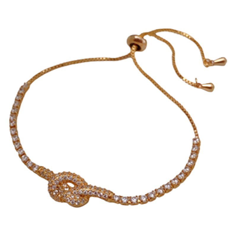 Real oro galvanizado ZIRCON anudada pulsera hueco simple pulsera elegante luz lujo alto sentido pulsera para las mujeres al por mayor