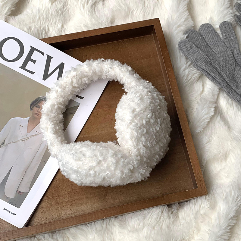 auriculares de invierno para mujeres auriculares cálidas 2025 otoño y invierno nuevo auriculares de color sólido anti ruido para dormir auriculares de vello de bicicleta al por mayor