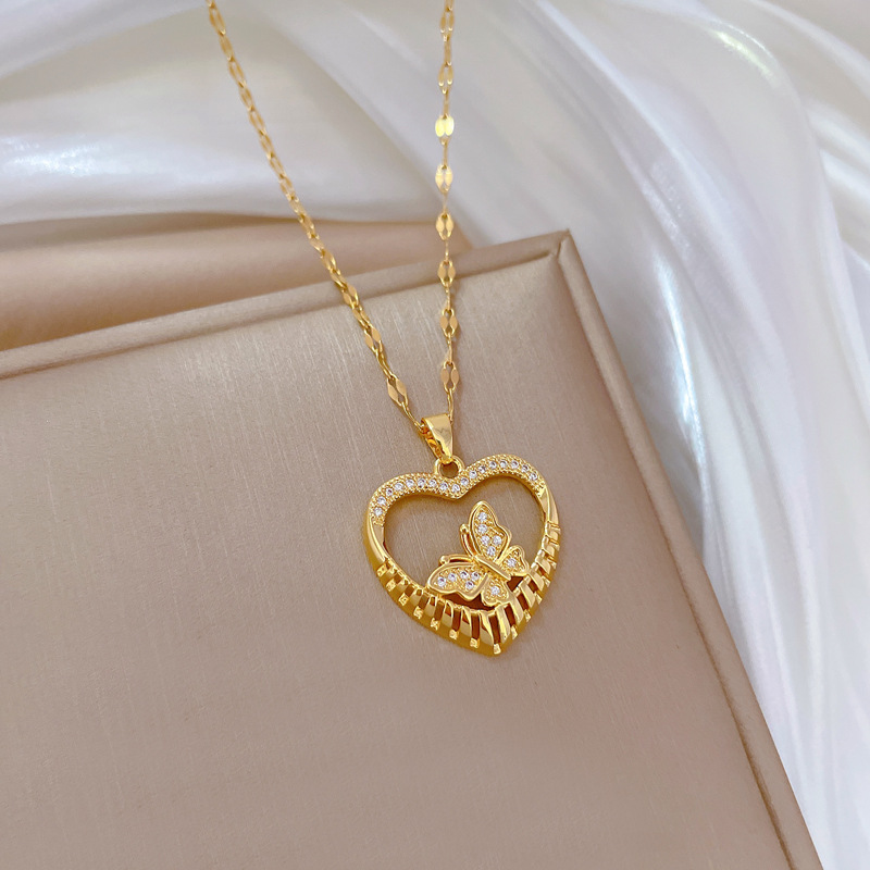 Wholesale IG Style Shiny Heart Shape Butterfly Titanium Steel Copper Hollow Out Inlay Zircon Pendant Necklace display picture 4