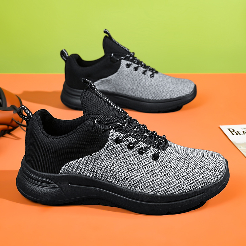 Zapatos transfronterizos de talla grande para hombre 2025 primavera y verano zapatos deportivos transpirables de malla negra tejida voladora zapatos para correr casuales de viaje para hombre