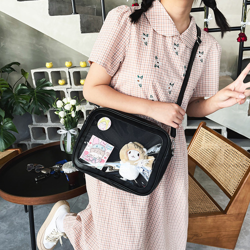 Japanese ins animation peripheral cute personality versatile street shooting soft girl student pain bag transparent girl doll bag