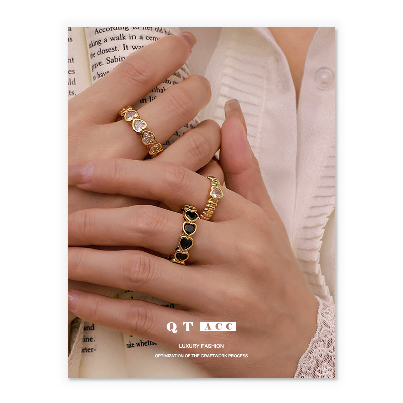 Latón chapado 18K oro real europeo y americano exagerado diseño hueco blanco y negro corazón circón anillo simple pulsera Retro