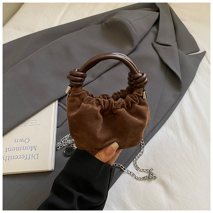 2025 nuevo bolso infantil coreano, mini bolso de ropa de bebé, bolso de hombro para hombres y mujeres, cadena de moda