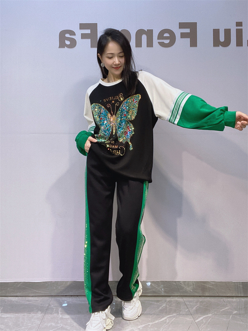 Trajes europeos de otoño de hombros de cuello redondo chaqueta de mangas largas pantalones largos trajes deportivos con diamantes de dos piezas