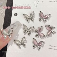 日本の新しいジルコンネイルアートジュエリーライト高級インターネット有名人 diy 中空猫の目弓光線療法ネイル装飾