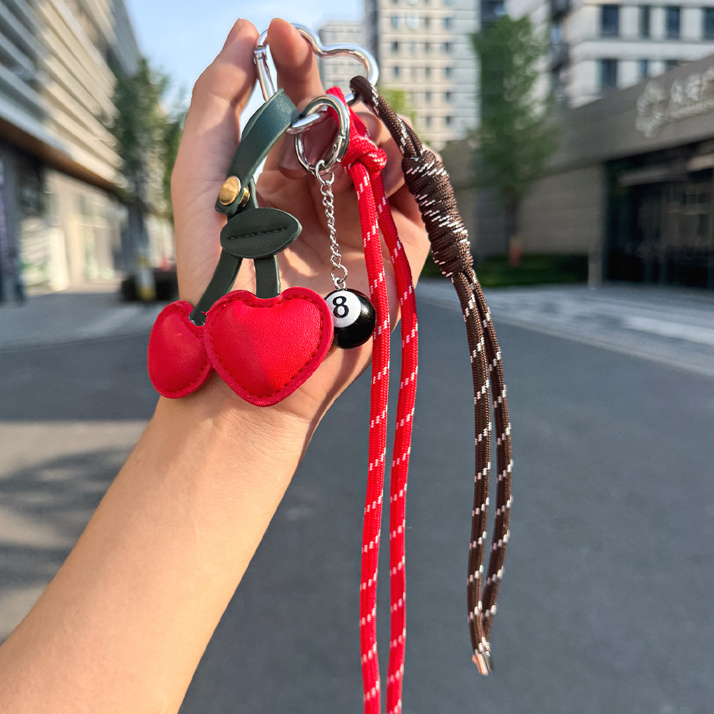 Nuevos productos transfronterizos creativos de letras de color cuerdas trenzadas llavero amor dibujos animados accesorios de diseño bolsos colgantes