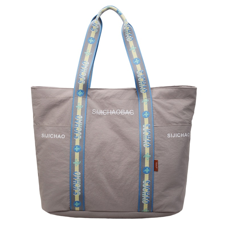 Bolsa de tela de nylon de gran capacidad para mujeres bolsas de impresión de letras de la ciudad simple viaje bolso de hombro bolso de mano ocio