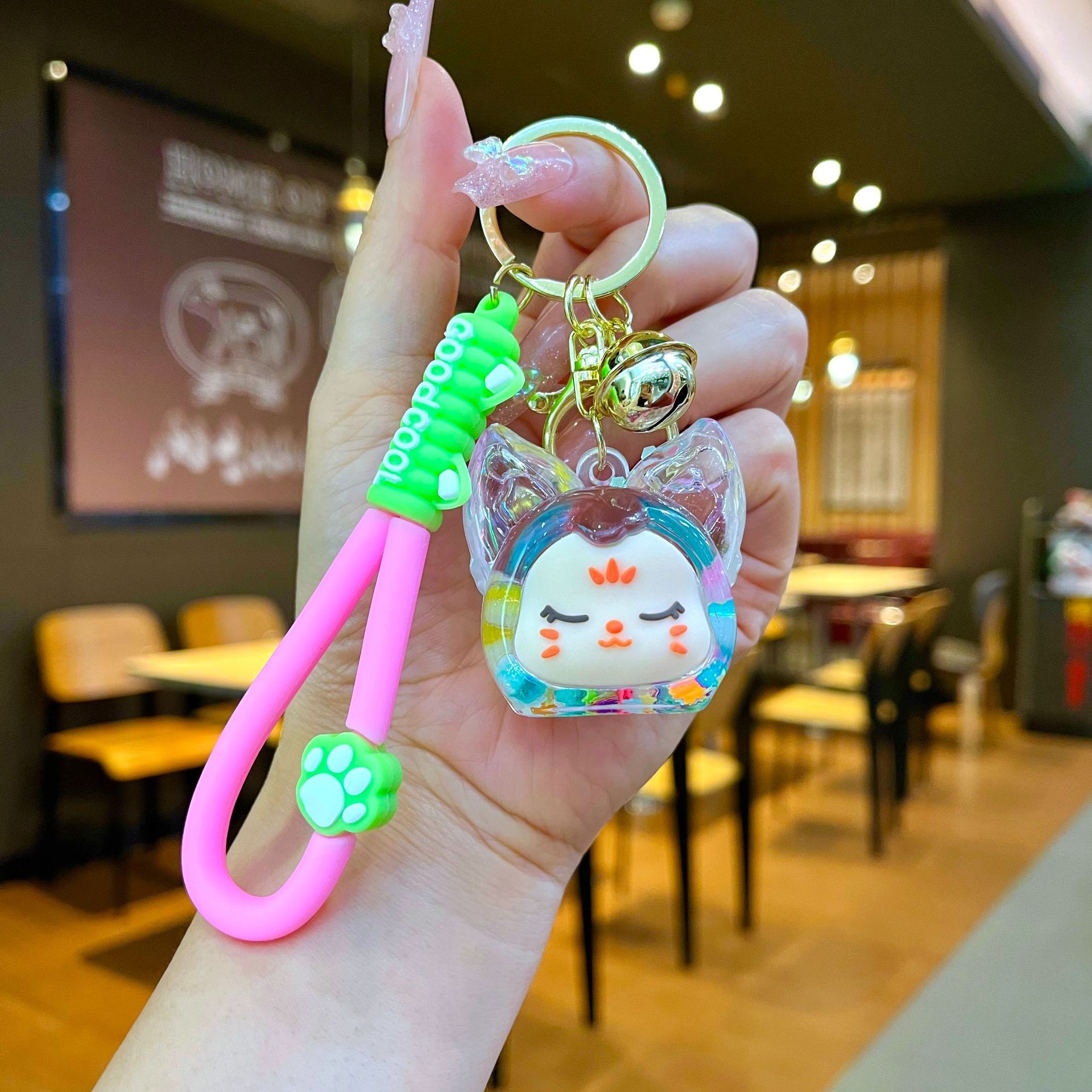 Nuevos productos acrílicos en aceite flotante botella de arena luminosa brillante nocturna KiKi zorro muñeca llavero mochila colgante bolsa al por mayor