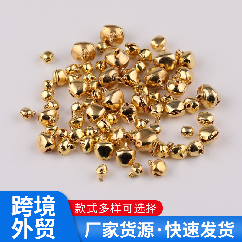 Hecho a mano accesorios de joyería de bricolaje campana de hierro de una palabra campana de oro mascota de dibujos animados decoración de Navidad boca plana campana pequeña