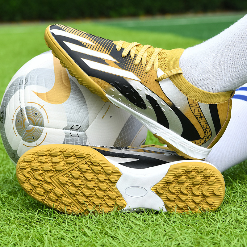 2025 nuevos zapatos de fútbol juveniles transfronterizos hombres y mujeres de clavos bajos zapatillas de fútbol fábrica directa