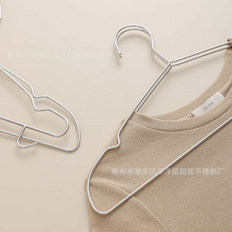 10つの荘304ステンレスの服の棚の卸売りは服の棚の家庭用成人の子供の防風の金属のハンガーを干します。|undefined