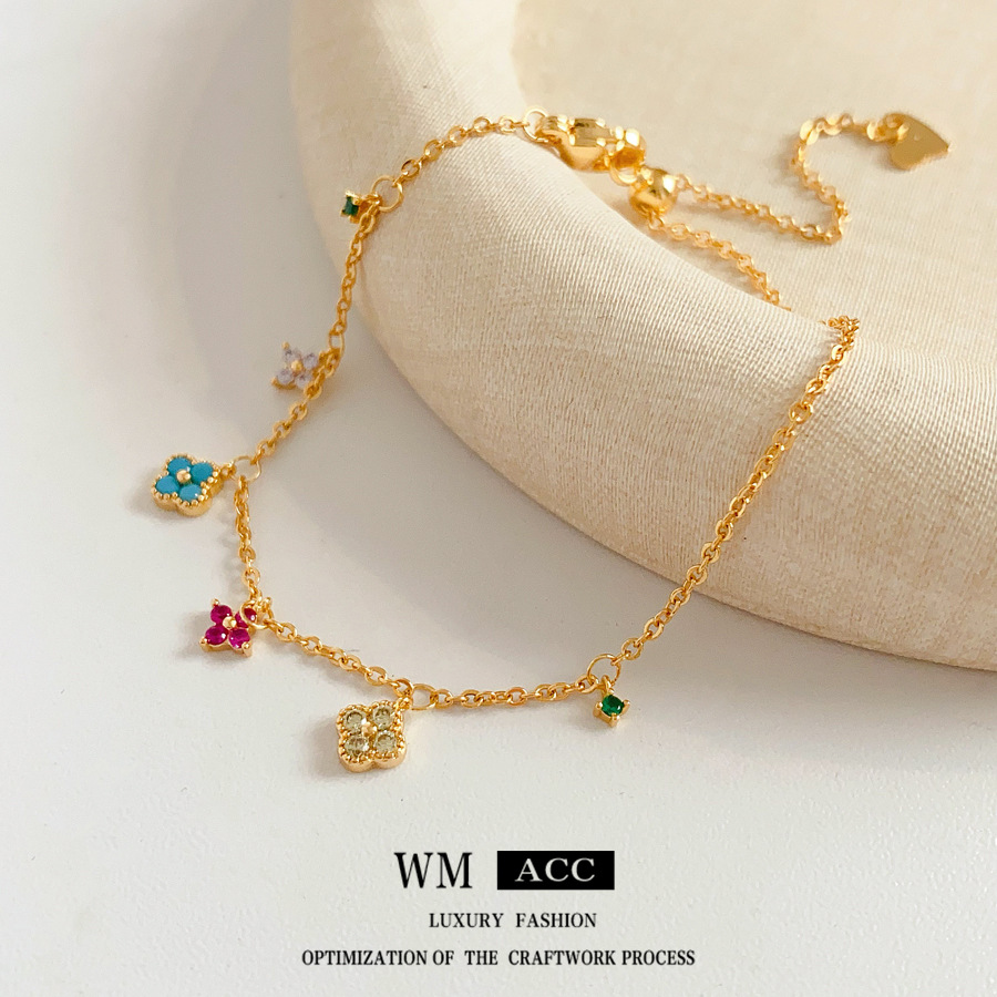 Pulsera de borla de flor de trébol de circonita Pulsera dulce de lujo ligero, de alta gama, joyería de moda de nicho al por mayor image 4