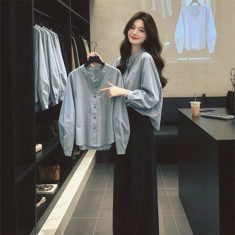 Hong Kong-style fashion stand-up collar long-sleeve shirt for women, 2026 autumn new collection, loose-fitting, elegant, and age-reducing design, women's shirt A14179-1 Hong Kong-style fashion stand-up collar long-sleeve shirt for women, 2026 autumn new collection, loose-fitting, elegant, and age-reducing design, women's shirt A14179-1