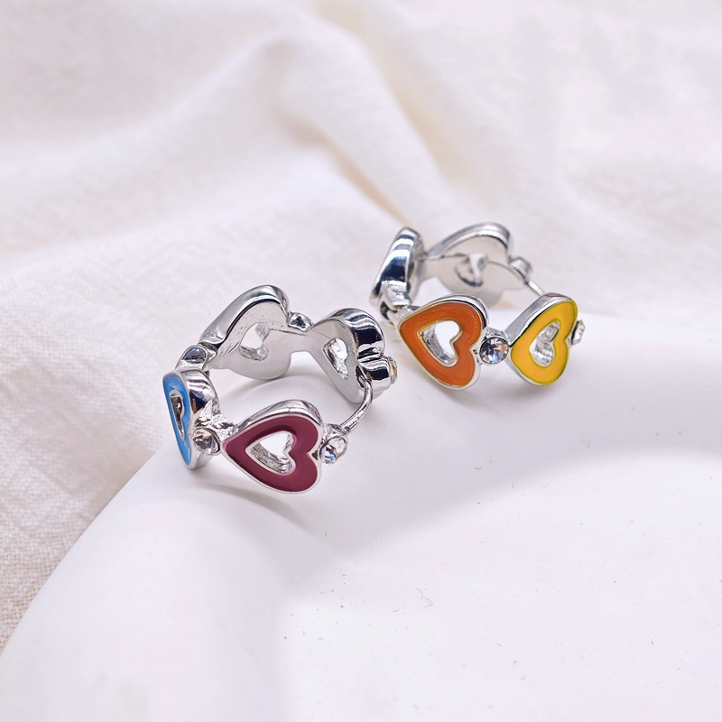 2024 nuevo diseño de nicho de color gotas de aceite letras de amor pendientes metal dulce niña alta sensación hebilla de oreja