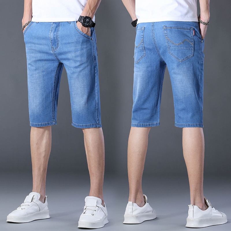 夏の薄いタイプの7分のズボンの男性のまっすぐな筒の紳士服のデニムのショートパンツの弾力性は夏の青年の中でズボンを修理します。|undefined
