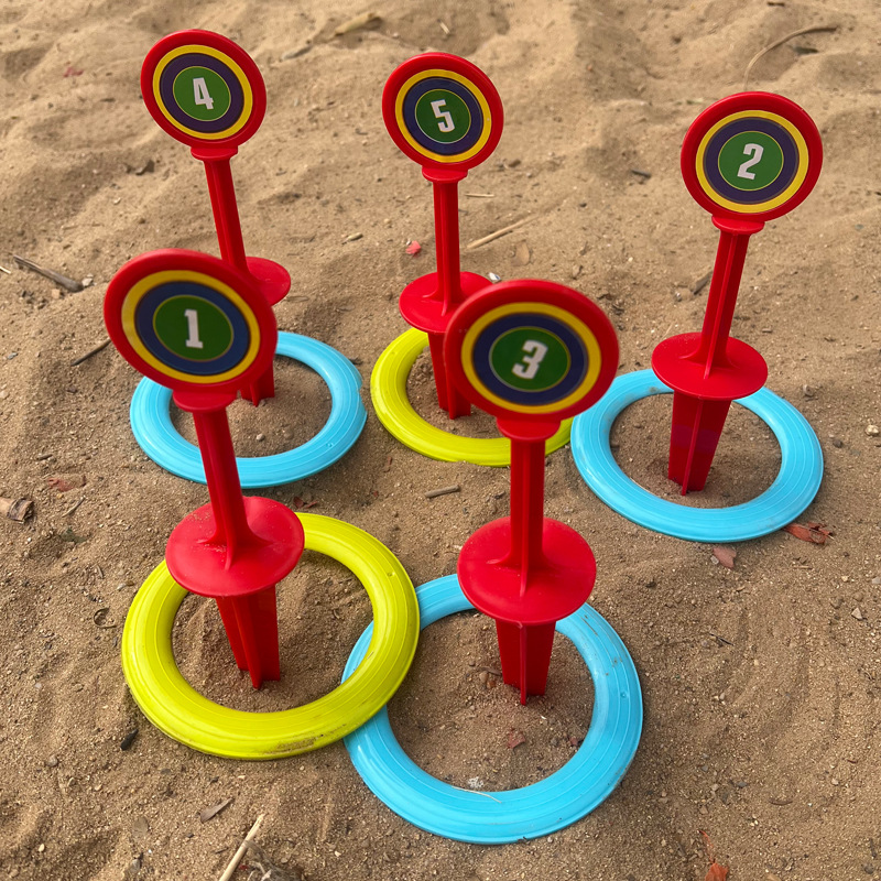 Juegos de anillos de juguetes al aire libre para niños juegos de anillos de pastizales de playa transfronterizos lanzamientos de actividades de expansión para niños al aire libre