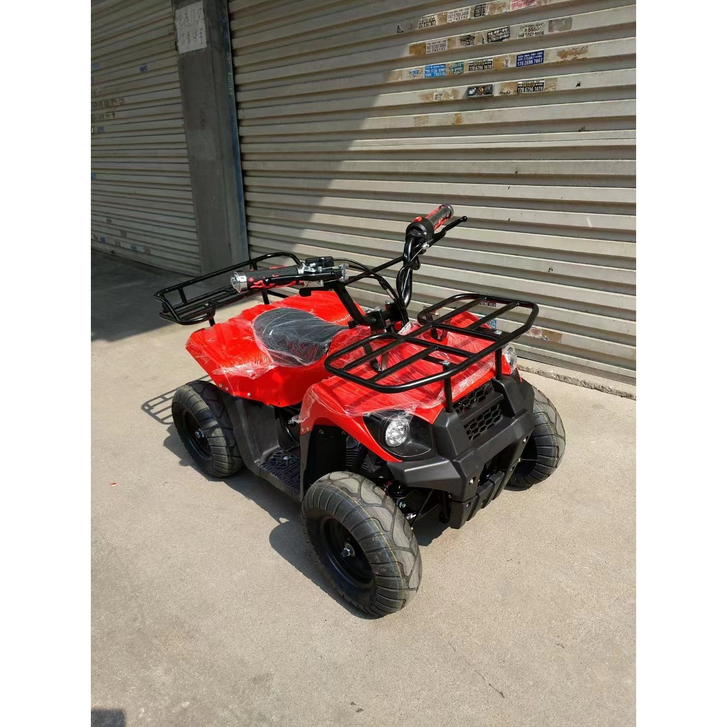 Little King Kong 49CC mini 2 tiempos ATV de cuatro ruedas motocicleta de montaña se puede encender y arrancar