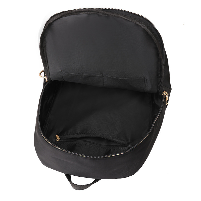 Bolsos para mujer 2024 nuevo bolso de nylon para mujer de color sólido para mujer simple y versátil mochila ligera para exteriores al por mayor