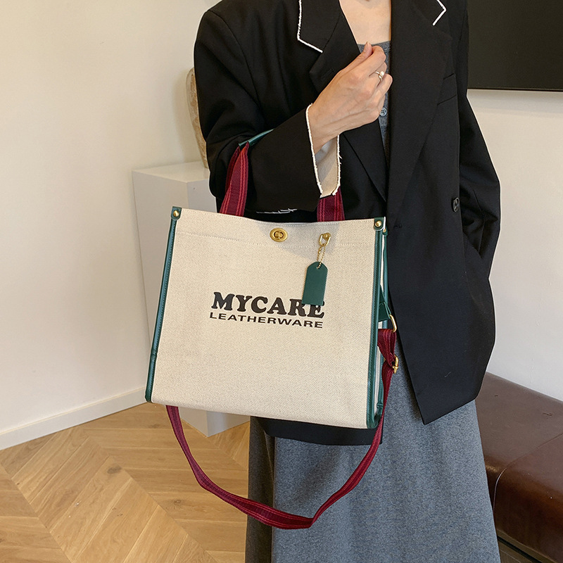 Gran capacidad de viaje al trabajo bolso de mano para mujeres 2024 nuevo lino retro color contraste mochila de hombro